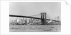 The Brooklyn Bridge spans the East River, ca. 1910. by Anonymous