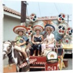 Mother and daughters as tourists in Tijuana, Mexico, ca. 1967 by Anonymous