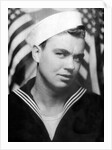 Photo booth portrait of WWII sailor, ca. 1943. by Anonymous