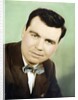 Mature man colorized studio portrait, ca. 1955. by Anonymous