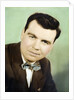 Mature man colorized studio portrait, ca. 1955. by Anonymous
