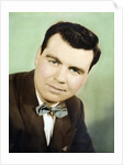 Mature man colorized studio portrait, ca. 1955. by Anonymous