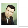 Mature man colorized studio portrait, ca. 1955. by Anonymous