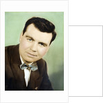 Mature man colorized studio portrait, ca. 1955. by Anonymous