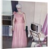 Grandma is all dressed up and standing next to a TV, ca. 1965 by Anonymous