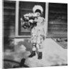 Young girl with a bouquet of flowers on her doorstep, ca. 1928. by Anonymous