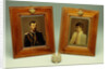 A pair of hand-coloured photos of Tsar Nicholas II & Alexandra and a cylindrical bowentie silver-mounted bell-push, marked Faberge by Anonymous