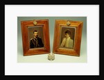 A pair of hand-coloured photos of Tsar Nicholas II & Alexandra and a cylindrical bowentie silver-mounted bell-push, marked Faberge by Anonymous
