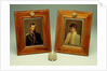 A pair of hand-coloured photos of Tsar Nicholas II & Alexandra and a cylindrical bowentie silver-mounted bell-push, marked Faberge by Anonymous