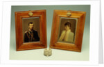 A pair of hand-coloured photos of Tsar Nicholas II & Alexandra and a cylindrical bowentie silver-mounted bell-push, marked Faberge by Anonymous