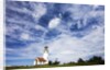 Cape Blanco Lighthouse on the Oregon Coastline with clouds by Anonymous