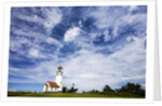 Cape Blanco Lighthouse on the Oregon Coastline with clouds by Anonymous