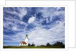 Cape Blanco Lighthouse on the Oregon Coastline with clouds by Anonymous