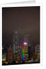 Nightly Light Show of The City of Hong Kong Draped in Fog by Anonymous