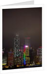 Nightly Light Show of The City of Hong Kong Draped in Fog by Anonymous