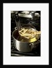 French fries in oil by Anonymous