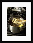 French fries in oil by Anonymous
