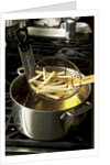 French fries in oil by Anonymous