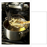 French fries in oil by Anonymous
