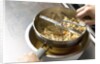 Ingredients in a food mill by Anonymous