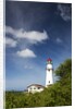 Morning light on Diamond Head Lighthouse with Puffy Clouds by Anonymous