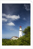 Morning light on Diamond Head Lighthouse with Puffy Clouds by Anonymous