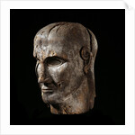 Etruscan sculpture of virile head by Anonymous