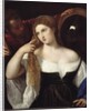 Portrait of a woman at a her toilet by Tiziano Vecellio