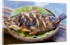 Grilled nila fish, served with banana leave by Anonymous