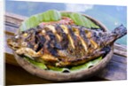 Grilled nila fish, served with banana leave by Anonymous