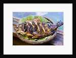 Grilled nila fish, served with banana leave by Anonymous