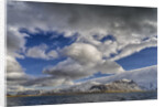 Clouds over fjord in the winter. by Anonymous