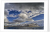 Clouds over fjord in the winter. by Anonymous