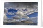 Clouds over fjord in the winter. by Anonymous