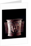 Funeral urn decorated with a human face by Anonymous