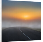 Empty road with fog and sunset. by Anonymous