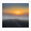 Empty road with fog and sunset. by Anonymous