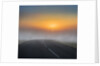 Empty road with fog and sunset. by Anonymous
