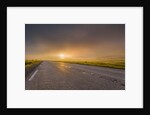 Empty road with fog and sunset. by Anonymous