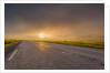 Empty road with fog and sunset. by Anonymous
