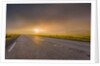 Empty road with fog and sunset. by Anonymous