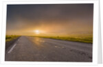 Empty road with fog and sunset. by Anonymous