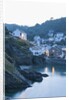 Polperro is a village with beautiful ancient houses along a canal by Anonymous