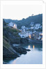 Polperro is a village with beautiful ancient houses along a canal by Anonymous