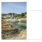 Polperro is a village with beautiful ancient houses along a canal by Anonymous
