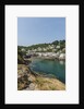 Polperro is a village with beautiful ancient houses along a canal by Anonymous