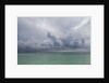 Rain clouds and thunderstorm at sea. by Anonymous