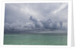 Rain clouds and thunderstorm at sea. by Anonymous