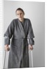 Woman on crutches by Anonymous