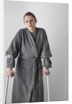Woman on crutches by Anonymous